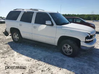 2003 Chevrolet Tahoe LS with VIN 1GNEC13Z03J213727, listed as a Copart auction lot 57206395 with 191,202 mi miles and Salvage title. Bid and sale history available at DreamBid. Image 4.