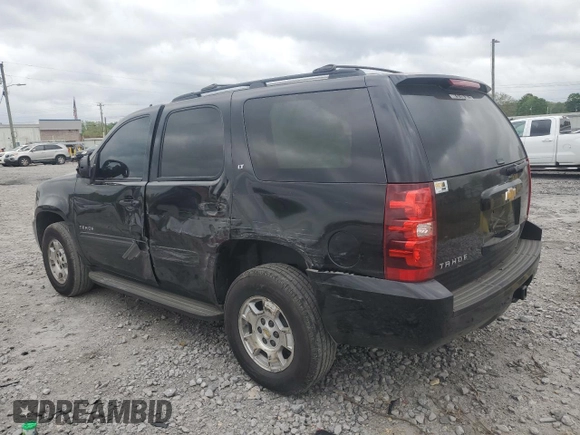2012 Chevrolet Tahoe LT with VIN 1GNSKBE07CR182889, listed as a Copart auction lot 51944005 with 184,085 mi miles and Salvage title. Bid and sale history available at DreamBid. Image 2.