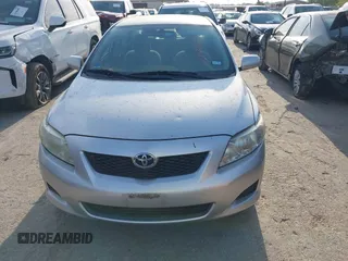 2009 Toyota Corolla with VIN 1NXBU40E59Z078727, listed as a IAAI auction lot 42035739 with 113,814 mi miles. Bid and sale history available at carsss.com. Image 6.