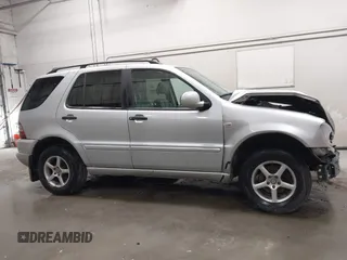 2000 Mercedes-Benz M 320/430/500 with VIN 4JGAB54E4YA199556, listed as a IAAI auction lot 42111380 with 155,061 mi miles and . Bid and sale history available at carsss.com. Image 13.