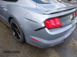 2022 Ford Mustang EcoBoost with VIN 1FA6P8TH8N5100076, listed as a IAAI auction lot 42476425 with 44,011 mi miles and . Bid and sale history available at DreamBid. Image 18.