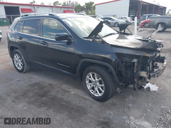 2014 Jeep Cherokee Altitude with VIN 1C4PJMCB5EW146365, listed as a IAAI auction lot 42021350 with 120,652 mi miles and . Bid and sale history available at DreamBid. Image 1.