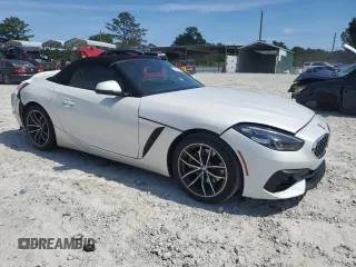 2022 BMW Z4 sDrive30i with VIN WBAHF3C05NWX38019, listed as a Copart auction lot 69311164 with 0 mi miles and Salvage Title. Bid and sale history available at carsss.com. Image 4.
