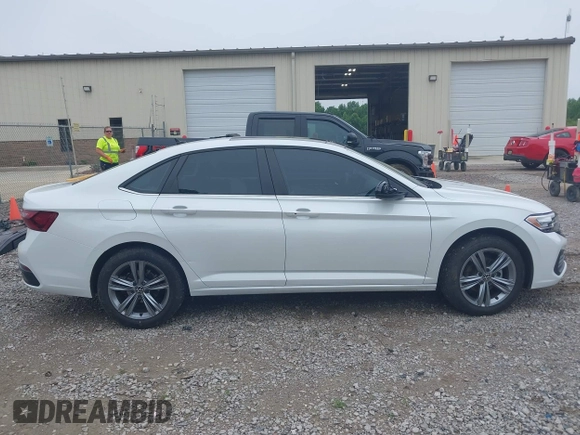 2023 Volkswagen Jetta SE with VIN 3VW7M7BU4PM061254, listed as a IAAI auction lot 42563741 with 35,468 mi miles and . Bid and sale history available at DreamBid. Image 13.
