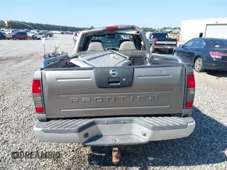 2003 Nissan Frontier SE z VIN 1N6ED29X43C402027, wystawiony jako IAAI lot #42252471 z przebiegiem 104 233 mil mil oraz . Historia ofert i sprzedaży dostępna na DreamBid. Obrazek 16.