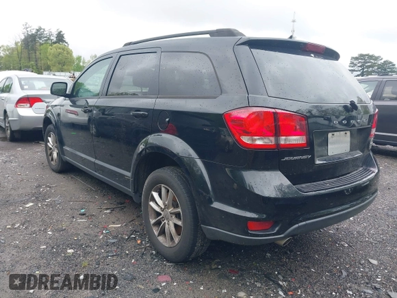 2016 Dodge Journey SXT with VIN 3C4PDCBG2GT100550, listed as a IAAI auction lot 41982670 with 184,601 mi miles. Bid and sale history available at carsss.com. Image 3.