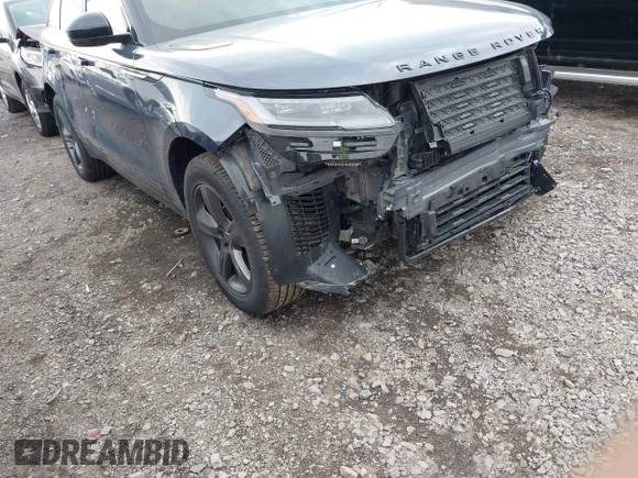 2025 Land Rover Range Rover Velar Dynamic SE with VIN SALYL2EX9SA809479, listed as a IAAI auction lot 42150495 with 7,038 mi miles and . Bid and sale history available at DreamBid. Image 18.
