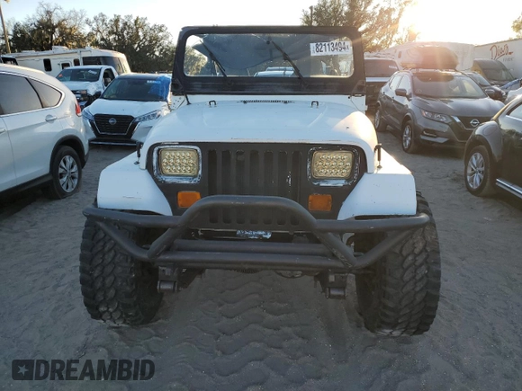 1989 Jeep Wrangler with VIN 2J4FY29T2KJ154190, listed as a Copart auction lot 82113494 with 131,026 mi miles and Clean Title. Bid and sale history available at carsss.com. Image 5.