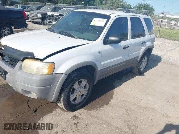 2002 Ford Escape XLT Choice with VIN 1FMYU03132KD02414, listed as a IAAI auction lot 42121509 with 218,148 mi miles and . Bid and sale history available at DreamBid. Image 2.