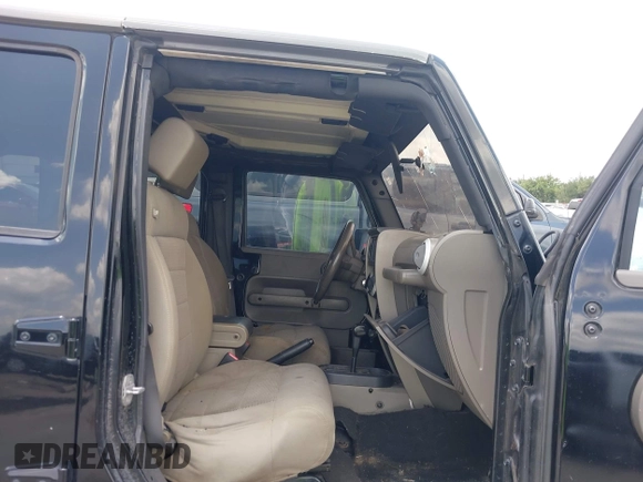 2008 Jeep Wrangler Unlimited Sahara with VIN 1J4GB59198L619802, listed as a IAAI auction lot 42361793 with 272,295 mi miles and . Bid and sale history available at DreamBid. Image 5.