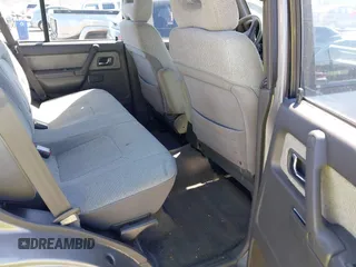 1993 Mitsubishi Montero z VIN JA4MR41H4PJ007602, wystawiony jako IAAI lot #41832401 z przebiegiem 191 549 mil mil oraz . Historia ofert i sprzedaży dostępna na DreamBid. Obrazek 8.