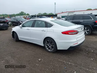 2020 Ford Fusion Titanium with VIN 3FA6P0RUXLR139574, listed as a IAAI auction lot 42299070 with 92,751 mi miles and . Bid and sale history available at DreamBid. Image 3.