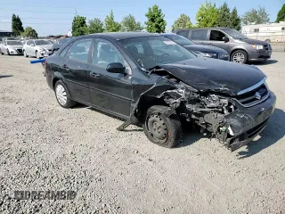 2008 Suzuki Forenza z VIN KL5JD56ZX8K974392, wystawiony jako Copart lot #64694854 z przebiegiem 145 180 mil mil oraz Szkoda całkowita • Salvage title. Historia ofert i sprzedaży dostępna na DreamBid. Obrazek 11.