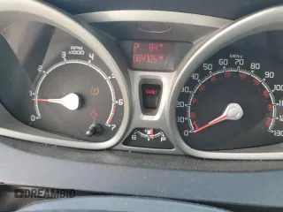 2012 Ford Fiesta SE z VIN 3FADP4EJ9CM148404, wystawiony jako Copart lot #59150695 z przebiegiem 84 705 mil mil oraz Czysty tytuł • Clean title. Historia ofert i sprzedaży dostępna na DreamBid. Obrazek 9.