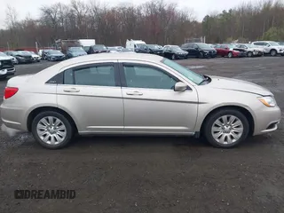 2014 Chrysler 200 LX with VIN 1C3CCBAB2EN213983, listed as a IAAI auction lot 42006774 with 80,615 mi miles and . Bid and sale history available at carsss.com. Image 13.