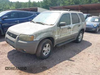 2002 Ford Escape XLT Choice with VIN 1FMYU03122KE08742, listed as a IAAI auction lot 42363962 with 299,455 mi miles and . Bid and sale history available at DreamBid. Image 2.