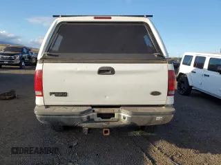 2003 Ford Super Duty F-250 XL with VIN 1FTNX21L83EB37779, listed as a Copart auction lot 77220014 with 160,011 mi miles and Salvage Title. Bid and sale history available at carsss.com. Image 6.
