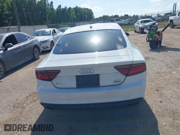2016 Audi A7 Premium Plus with VIN WAUWGAFC2GN021696, listed as a IAAI auction lot 42595234 with 112,464 mi miles and . Bid and sale history available at DreamBid. Image 16.