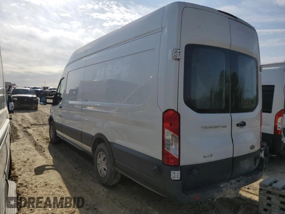 2017 Ford Transit with VIN 1FTYR3XG9HKB12597, listed as a Copart auction lot 52020935 with 281,009 mi miles and Salvage title. Bid and sale history available at DreamBid. Image 2.