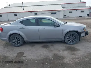 2014 Dodge Avenger SE with VIN 1C3CDZABXEN155014, listed as a IAAI auction lot 41554588 with 154,145 mi miles and . Bid and sale history available at DreamBid. Image 13.