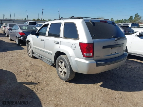 2007 Jeep Grand Cherokee Laredo with VIN 1J8HS48P77C595484, listed as a IAAI auction lot 41775290 with 176,751 mi miles. Bid and sale history available at carsss.com. Image 3.