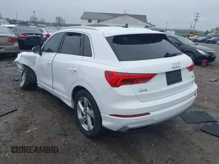 2020 Audi Q3 Premium with VIN WA1AECF35L1030273, listed as a IAAI auction lot 42006553 with 81,944 mi miles. Bid and sale history available at carsss.com. Image 3.