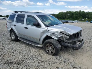 2004 Dodge Durango Limited with VIN 1D4HD58D94F154997, listed as a Copart auction lot 58973804 with 208,595 mi miles and Salvage title. Bid and sale history available at DreamBid. Image 4.