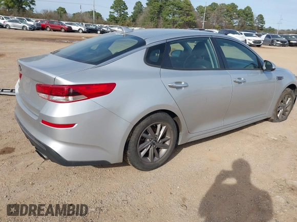 2020 Kia Optima LX with VIN 5XXGT4L34LG439434, listed as a IAAI auction lot 41743129 with 77,409 mi miles and . Bid and sale history available at carsss.com. Image 4.