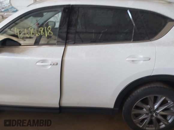 2019 Mazda CX-5 Grand Touring with VIN JM3KFBDM5K0520852, listed as a IAAI auction lot 42686818 with 36,800 mi miles and . Bid and sale history available at DreamBid. Image 14.
