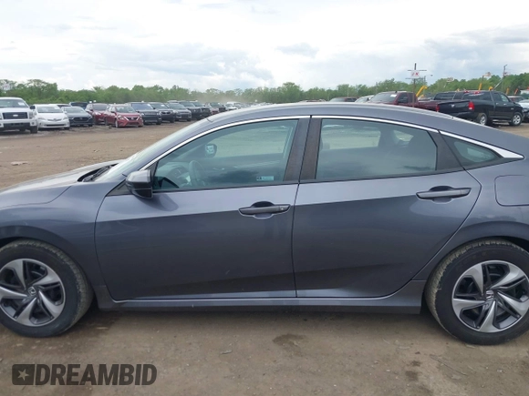 2020 Honda Civic LX z VIN 2HGFC2F62LH547412, wystawiony jako IAAI lot #42254847 z przebiegiem 62 519 mil mil oraz . Historia ofert i sprzedaży dostępna na DreamBid. Obrazek 14.