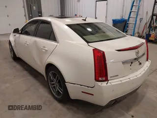 2008 Cadillac CTS AWD w/1SB with VIN 1G6DT57V880142764, listed as a IAAI auction lot 42037968 with 141,208 mi miles. Bid and sale history available at carsss.com. Image 3.