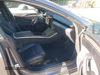2022 Tesla Model S with VIN 5YJSA1E57NF479056, listed as a IAAI auction lot 42091009 with 78,272 mi miles and . Bid and sale history available at DreamBid. Image 5.