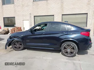 2015 BMW X4 xDrive35i with VIN 5UXXW5C50F0E87728, listed as a IAAI auction lot 41819628 with 136,042 mi miles and . Bid and sale history available at DreamBid. Image 15.