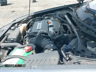 2009 Honda Accord LX-S with VIN 1HGCS12389A015746, listed as a IAAI auction lot 42697674 with 110,922 mi miles and . Bid and sale history available at DreamBid. Image 12.