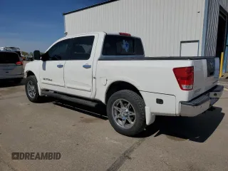2011 Nissan Titan Pro-4X with VIN 1N6BA0EC2BN317628, listed as a Copart auction lot 52367505 with 178,601 mi miles and Salvage title. Bid and sale history available at DreamBid. Image 2.