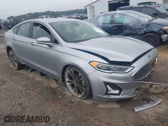 2020 Ford Fusion Titanium with VIN 3FA6P0D99LR138127, listed as a IAAI auction lot 42439024 with 128,792 mi miles and . Bid and sale history available at DreamBid. Image 1.