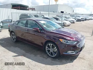 2017 Ford Fusion Titanium z VIN 3FA6P0K97HR214485, wystawiony jako IAAI lot #40208619 z przebiegiem 39 265 mil mil oraz . Historia ofert i sprzedaży dostępna na DreamBid. Obrazek 1.