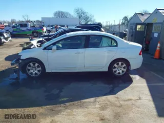 2006 Honda Civic Sdn LX with VIN 1HGFA16596L001799, listed as a IAAI auction lot 41262945 with 161,946 mi miles. Bid and sale history available at carsss.com. Image 14.