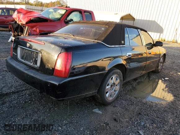 2003 Cadillac DeVille DTS z VIN 1G6KF57963U245281, wystawiony jako Copart lot #79911554 z przebiegiem Nie podano mil oraz Szkody całkowita. Historia ofert i sprzedaży dostępna na DreamBid. Obrazek 3.