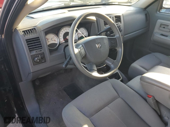 2006 Dodge Dakota SLT with VIN 1D7HW42K46S524262, listed as a Copart auction lot 82985654 with 124,170 mi miles and Salvage Title. Bid and sale history available at DreamBid. Image 8.