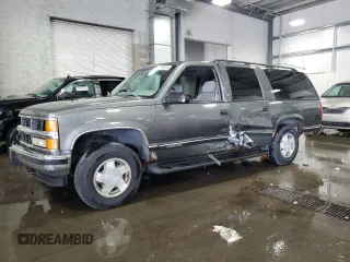 1999 Chevrolet Suburban with VIN 3GNFK16R8XG149091, listed as a Copart auction lot 71300024 with 254,044 mi miles and Salvage Title. Bid and sale history available at carsss.com. Image 1.