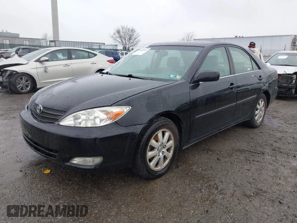 2003 Toyota Camry LE with VIN 4T1BE30K13U144114, listed as a IAAI auction lot 41829879 with 60,385 mi miles and . Bid and sale history available at DreamBid. Image 17.