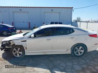 2014 Kia Optima LX with VIN 5XXGM4A73EG322983, listed as a IAAI auction lot 41708101 with 84,334 mi miles. Bid and sale history available at carsss.com. Image 14.