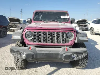 2024 Jeep Wrangler Rubicon with VIN 1C4PJXFG9RW346079, listed as a Copart auction lot 77006914 with 2,446 mi miles and Salvage Title. Bid and sale history available at DreamBid. Image 5.