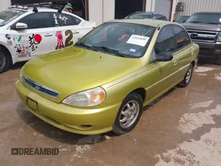 2001 Kia Rio with VIN KNADC123616048085, listed as a IAAI auction lot 42025600 with 123,493 mi miles. Bid and sale history available at carsss.com. Image 2.