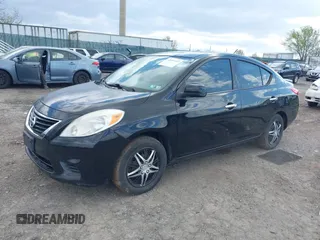 2014 Nissan Versa SV with VIN 3N1CN7AP7EL811097, listed as a IAAI auction lot 42051169 with 121,761 mi miles. Bid and sale history available at carsss.com. Image 6.