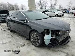 2015 Lincoln MKZ z VIN 3LN6L2JK5FR625611, wystawiony jako Copart lot #42424535 z przebiegiem 114 897 mil mil oraz Czysty tytuł • Clean title. Historia ofert i sprzedaży dostępna na DreamBid. Obrazek 14.