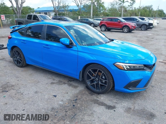 2023 Honda Civic Sport Touring z VIN 19XFL1H84PE002868, wystawiony jako IAAI lot #41978174 z przebiegiem 42 604 mil mil oraz . Historia ofert i sprzedaży dostępna na DreamBid. Obrazek 1.