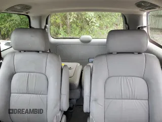 2004 Kia Sedona LX with VIN KNDUP131446581402, listed as a Copart auction lot 68083144 with 171,868 mi miles and Clean Title. Bid and sale history available at carsss.com. Image 10.