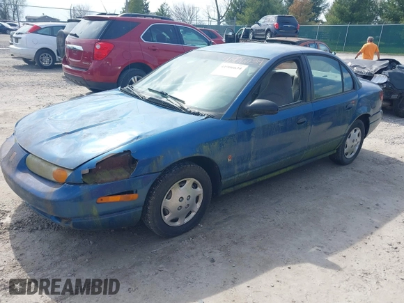 2002 Saturn SL z VIN 1G8ZG52822Z132267, wystawiony jako IAAI lot #41906634 z przebiegiem 144 001 mil mil oraz . Historia ofert i sprzedaży dostępna na DreamBid. Obrazek 2.